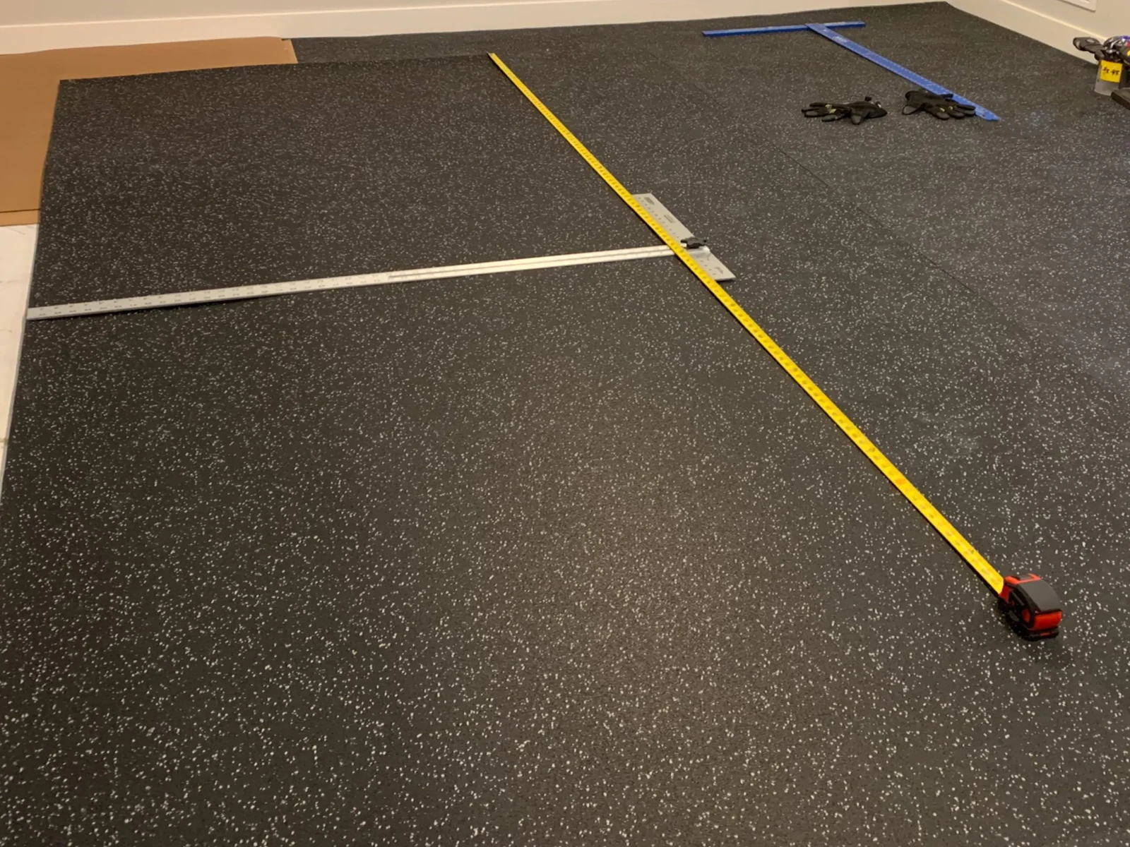 Professional flooring crew following safe work practices